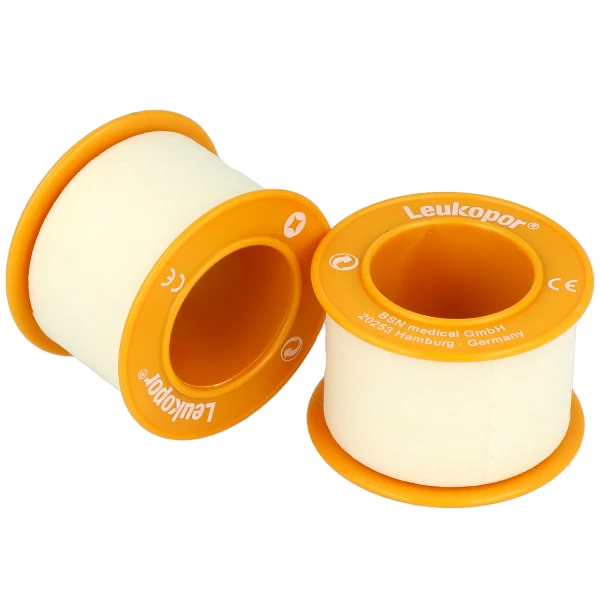 Zwei orangene Rollenpflaster